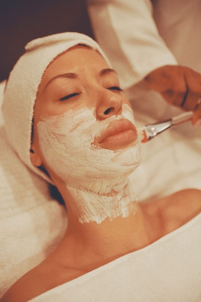 Facial peel being applied with a brush