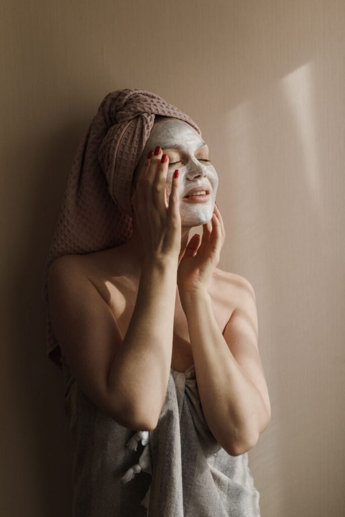 Woman with glowing skin after a facial at a Woking beauty salon